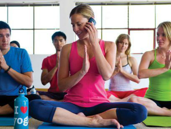 mobile phone in yoga class